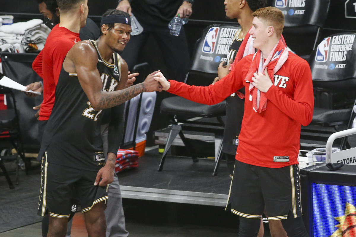Atlanta Hawks forward Cam Reddish (22) celebrates with guard Kevin Huerter